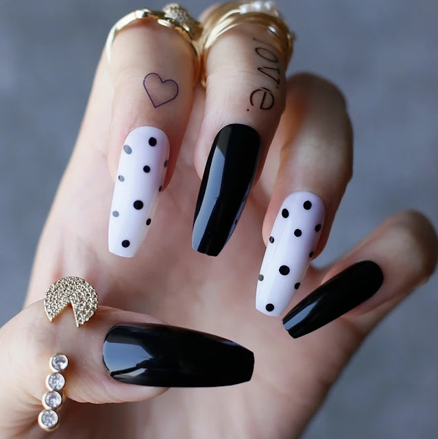 White and black polka dots nails