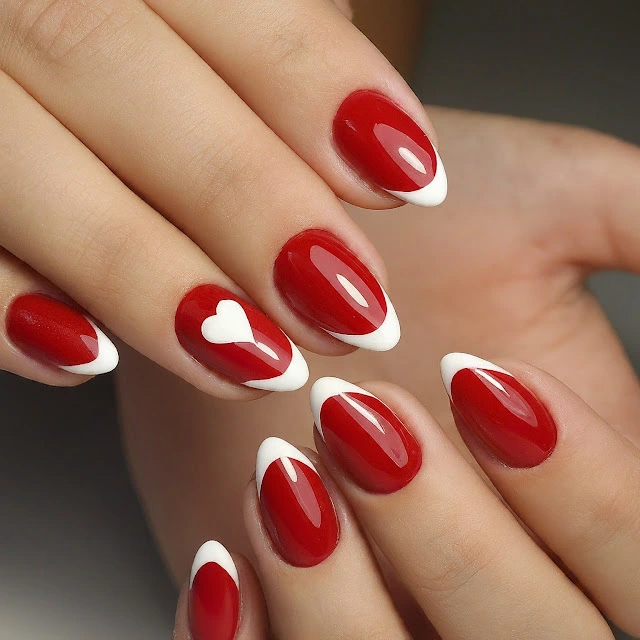 Short red nails with white hearts