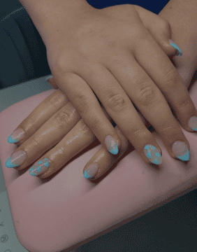 Pastel blue nails with hearts