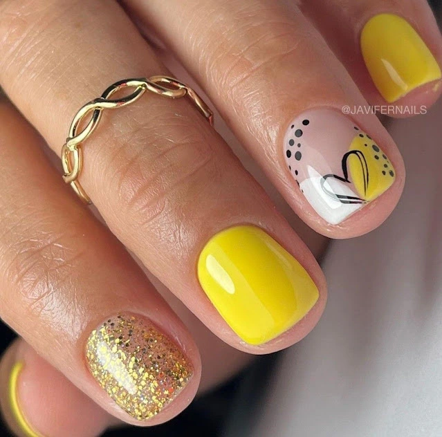 Bold yellow heart Nail design for short Nails