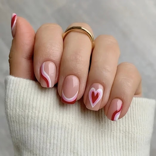 Image featuring nail art with hearts