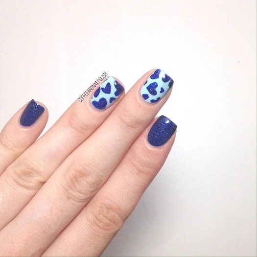 Light and dark short blue nails with hearts