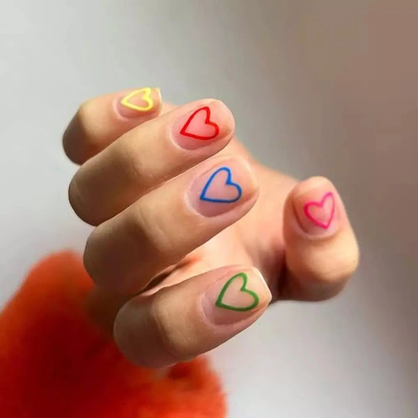 Negative space Heart Outline Nail design for short nails