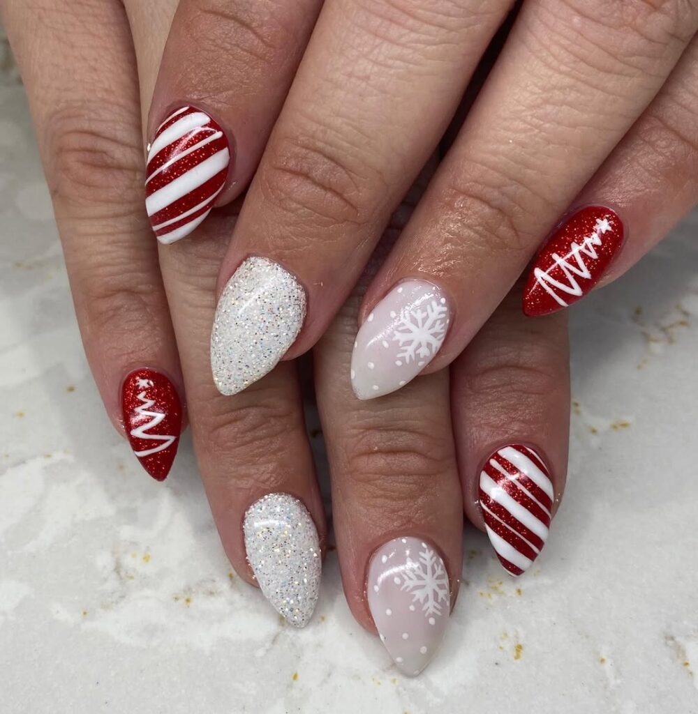 Candy cane nail art with snowflakes