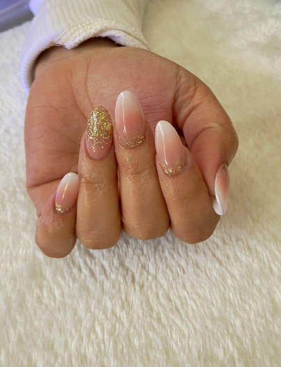 Ombre nails with gold glitter