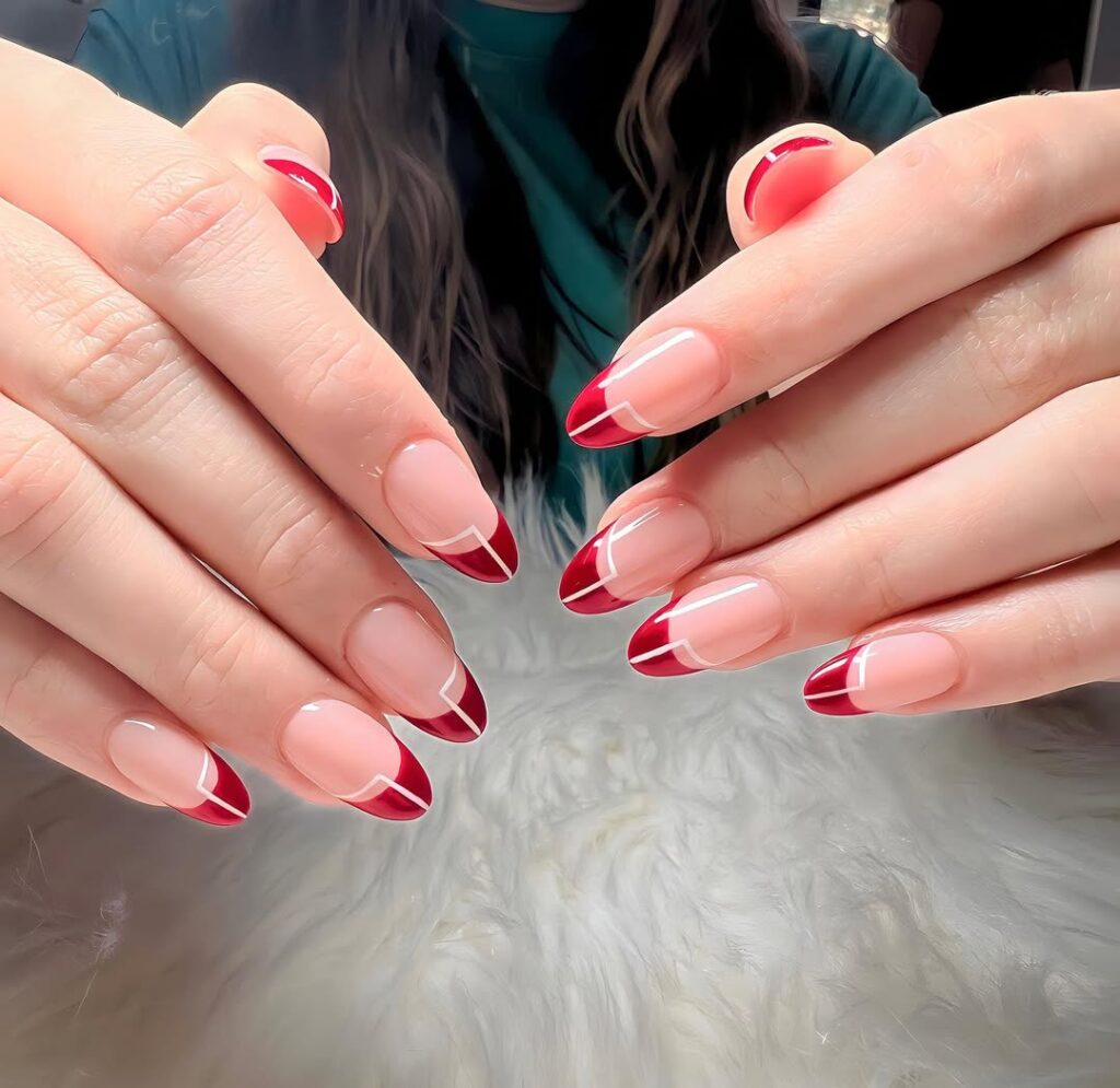 Red french tip nails with white accent