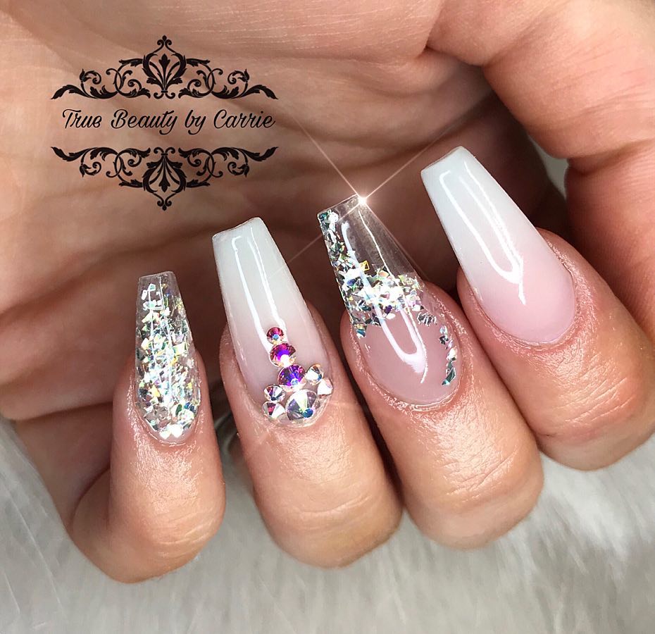 Hands showing Sparkly ombre nails 