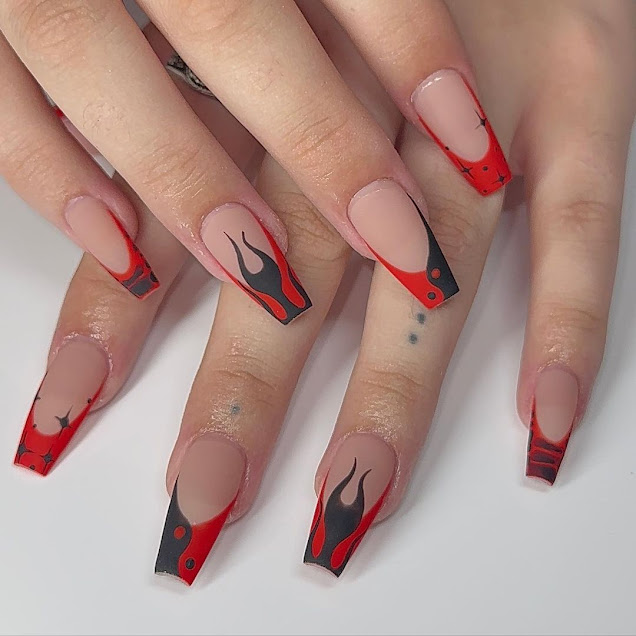 Image featuring flame nail art in red and black