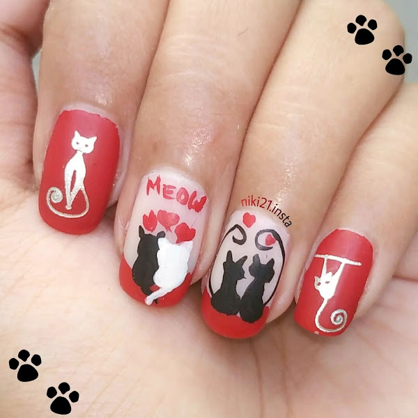 Nails image featuring Red, black and white pretty kitty nail art on short nails