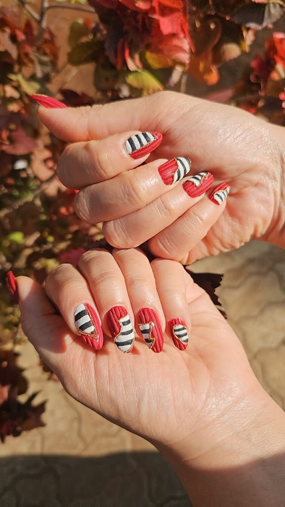 Autumn themed textured red black and white nails