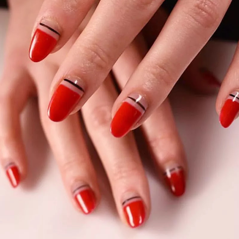 glossy red french tip nails with black line