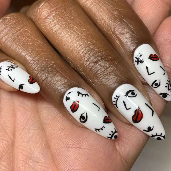 Image featuring bold nail art with facial features