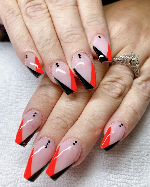 Image featuring Diagonal french tip Nails in dark red and black color