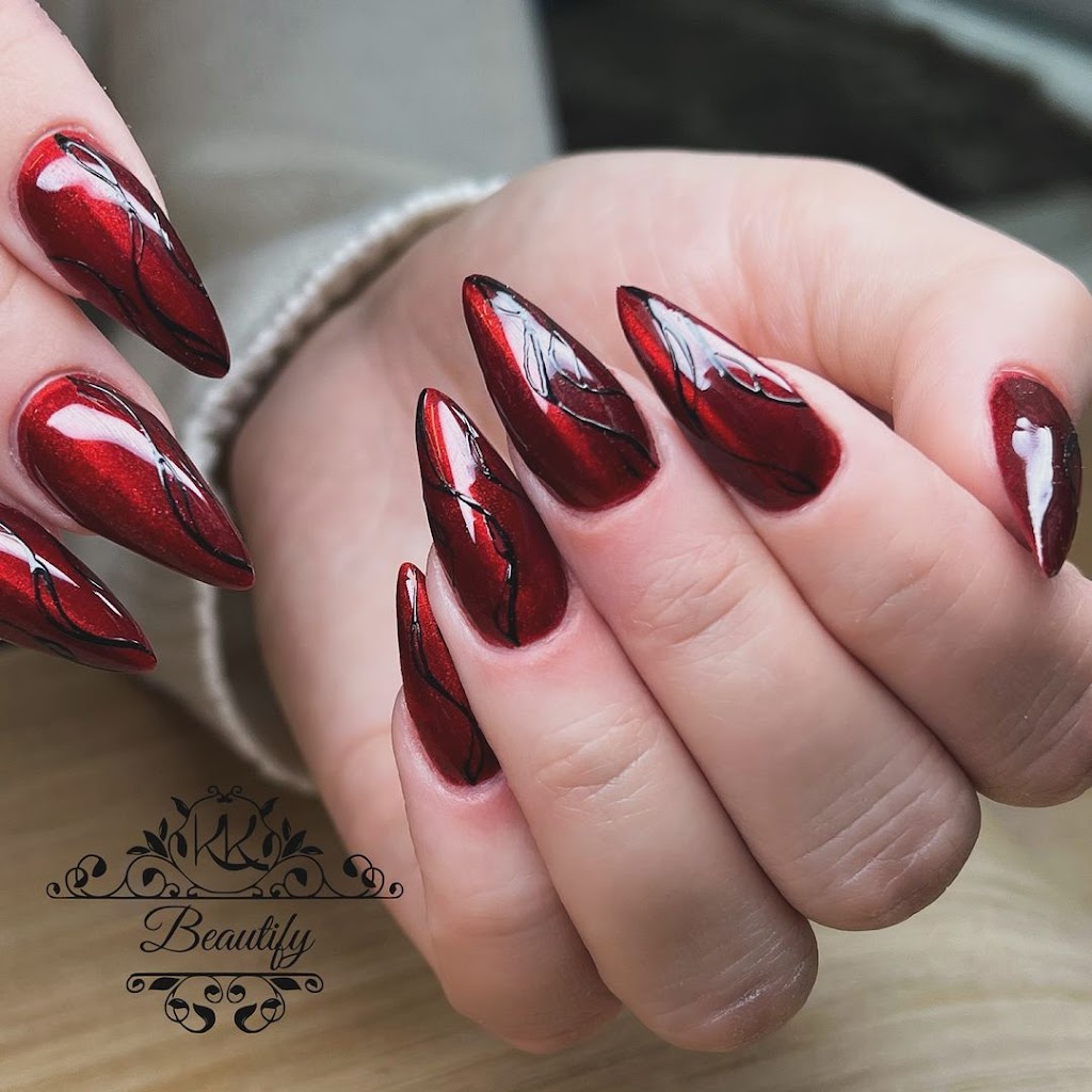 Wine red nails with random black lines