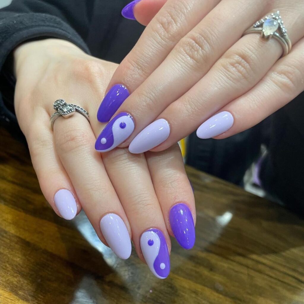 Purple yin yang nails