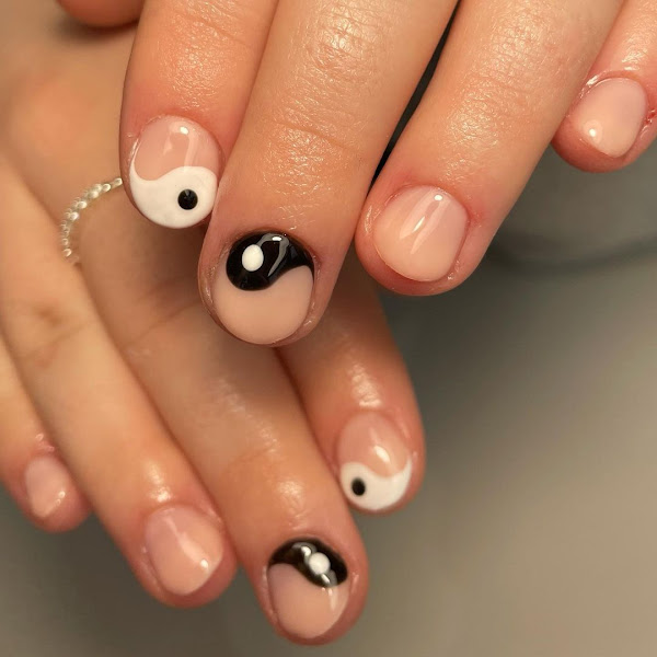 Black and white yin yang nail art on straight nails