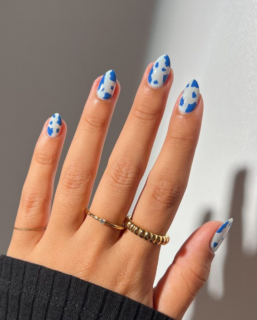 Blue cow print nails