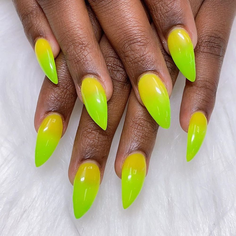 neon green and yellow ombre stiletto shaped nails