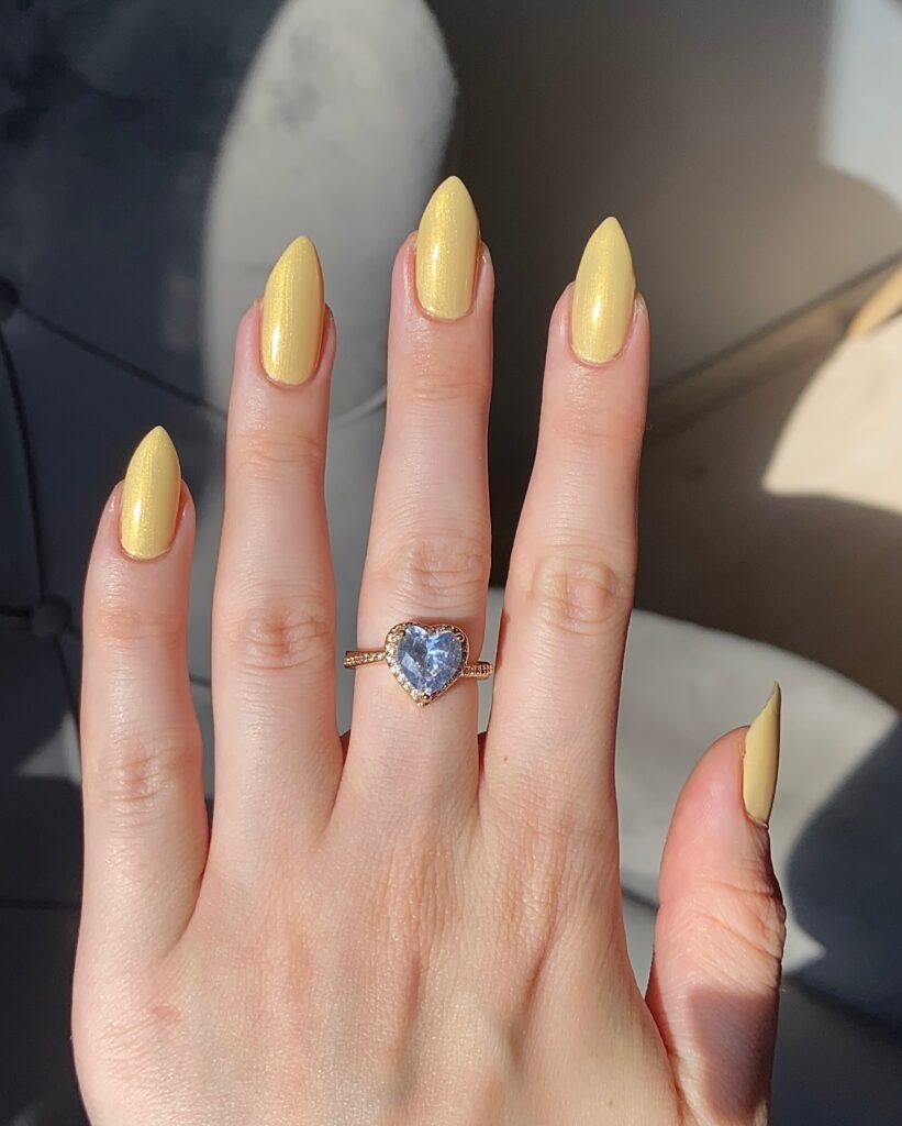 Pastel yellow chrome nails