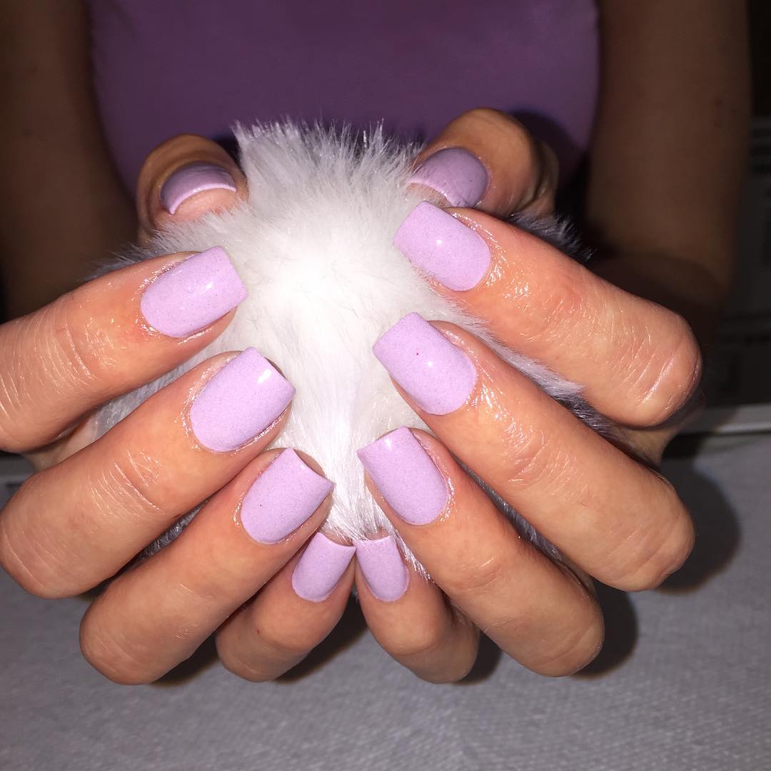 Simple and short light purple aka lavender nexgen nails on medium skin tone hands