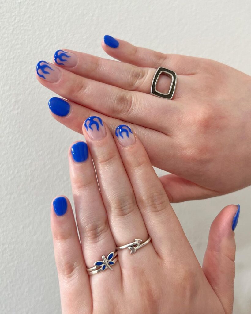 Short blue flame nails 