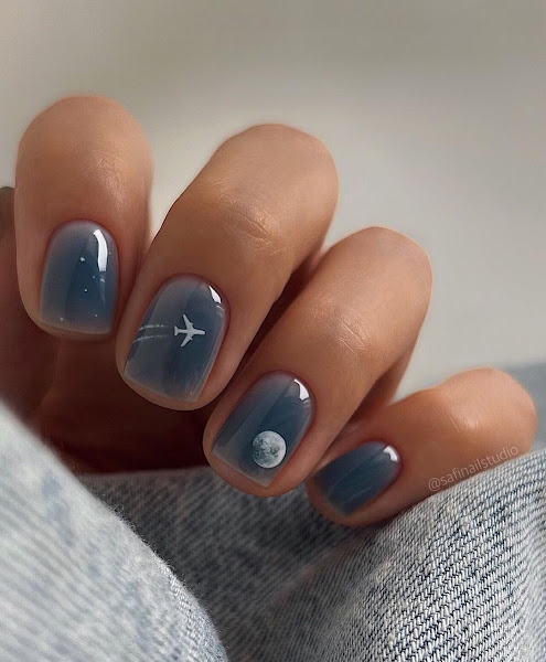 Nails with space and heavenly bodies related art