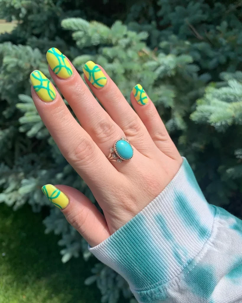 Nail art using yellow and green nail polish