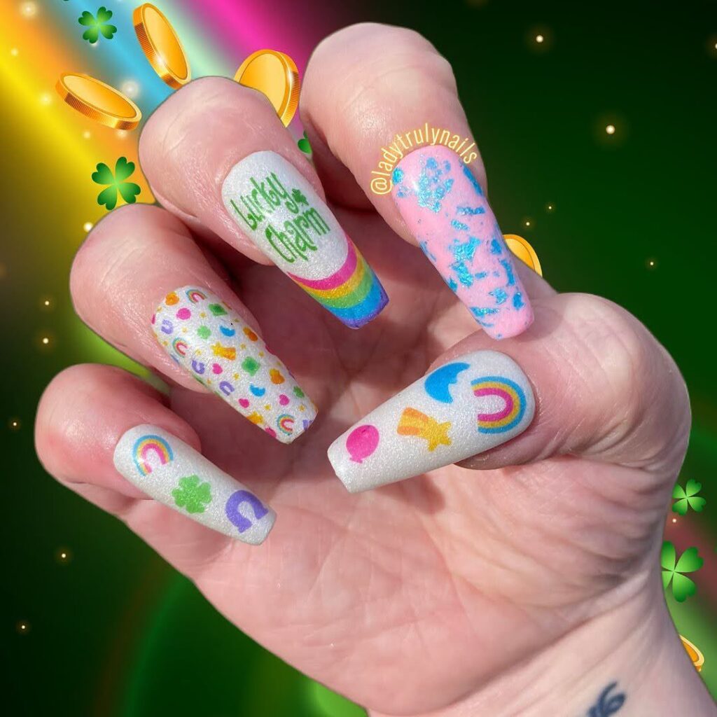 long and Cute colorful lucky charm nails having nexgen white glowing base