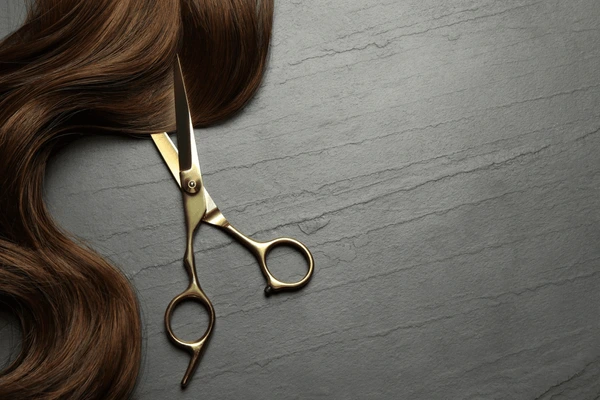 Scissor with hair