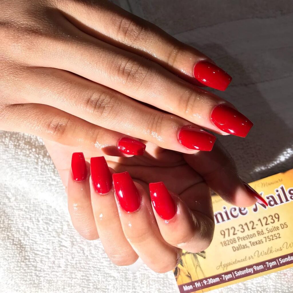 red nexgen nails in shape coffin