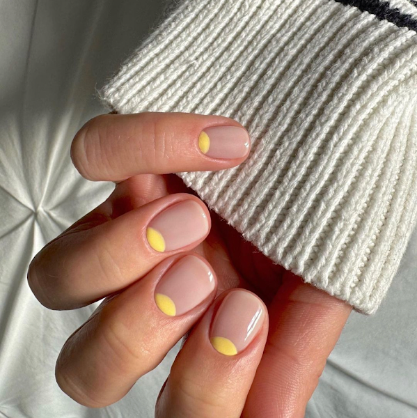 Little yellow half moons at the bottom of the nails