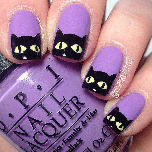 Purple and black evil cat nails