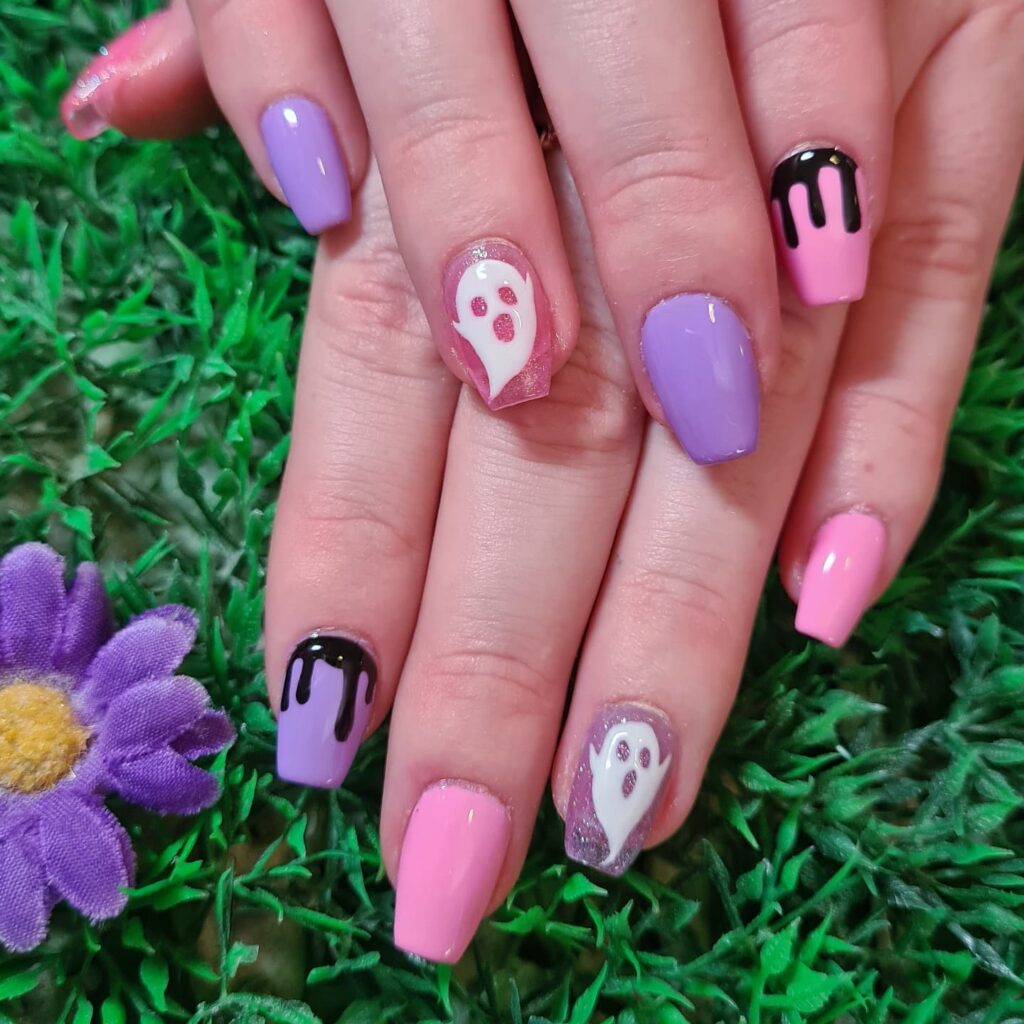 Cute Purple and pink halloween nails with ghost accent