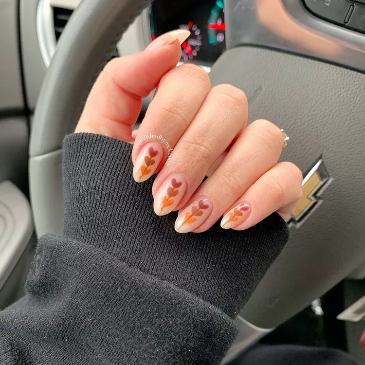 Center-aligned Negative spaced heart nail design for fall