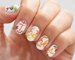 Thanksgiving Nail art with text written