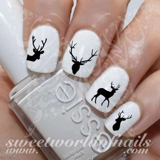 black and white deer nail art