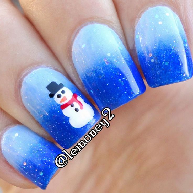 Blue gradient nails with snowman