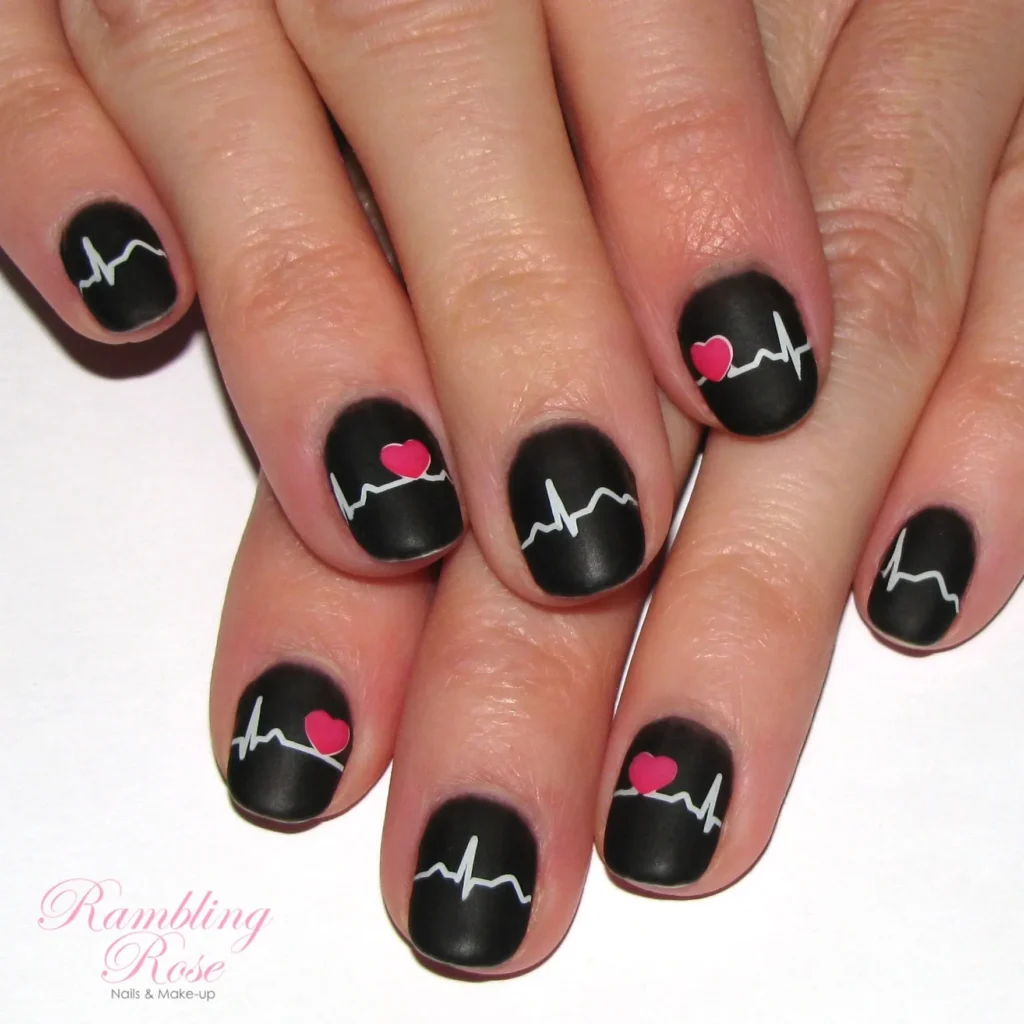 Pink and black heart nails with life line design