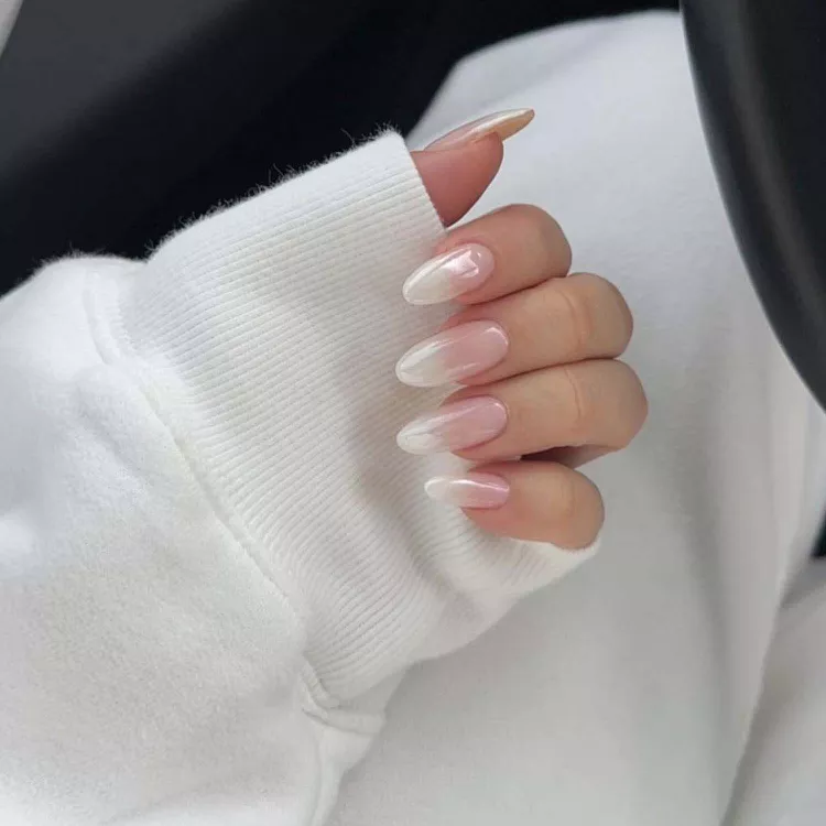 Pink and white frosted french tip almond nails