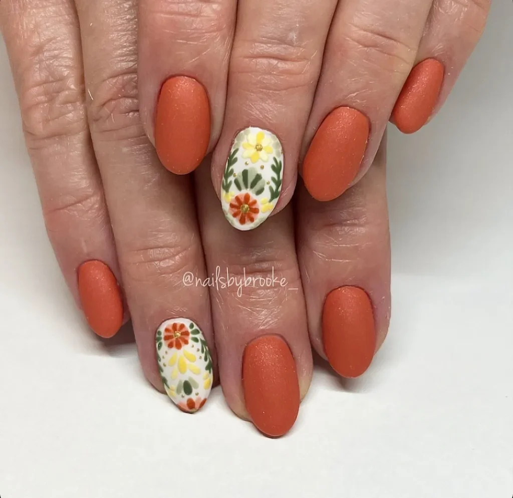 Rust orange nail art