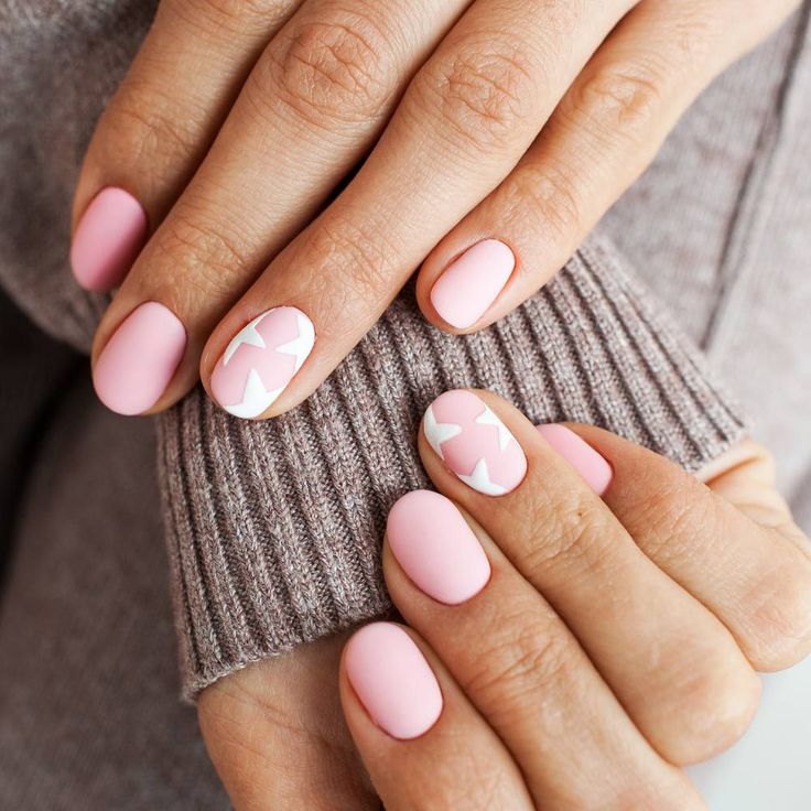 Short matte pink nails with pink stars