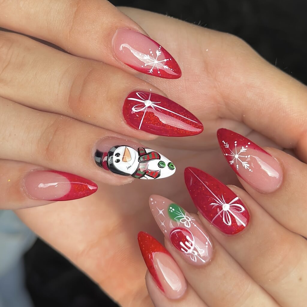 Red and white Snowman nails with wrapped bow design.