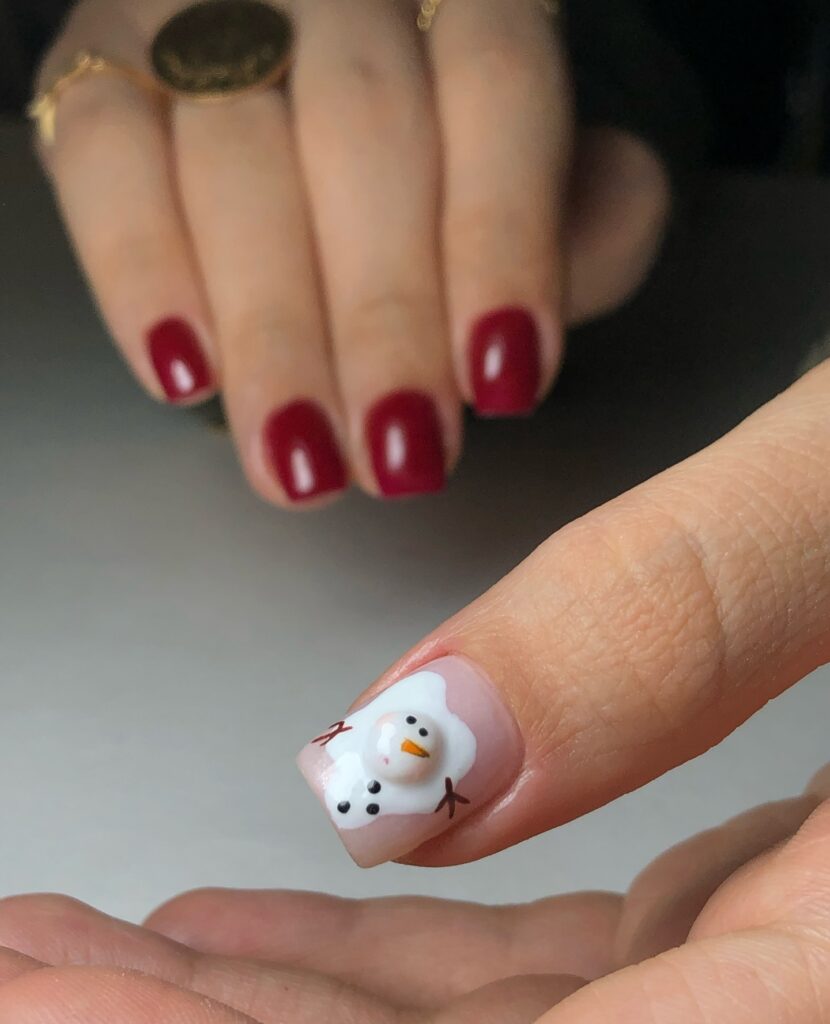 cute melting snowman nail art