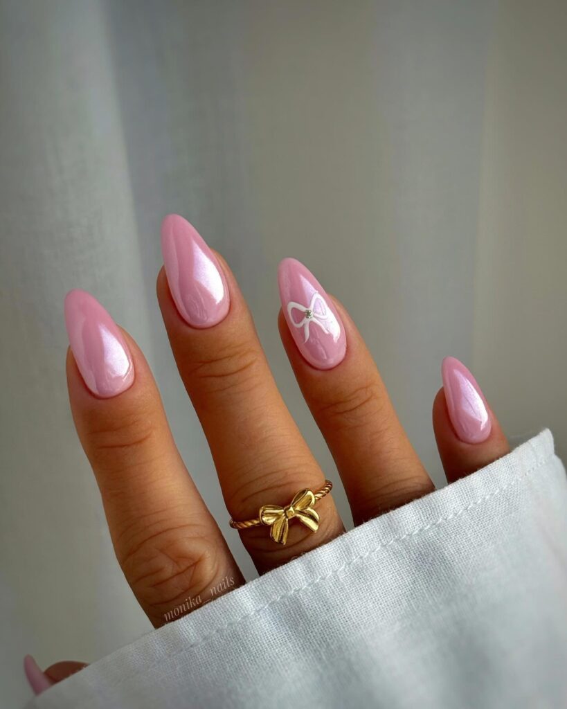 pink chrome nails with bow