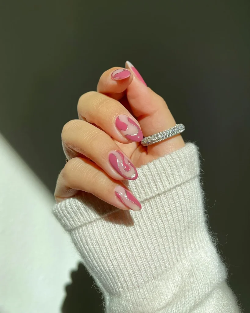 Mauve swirls on almond nails