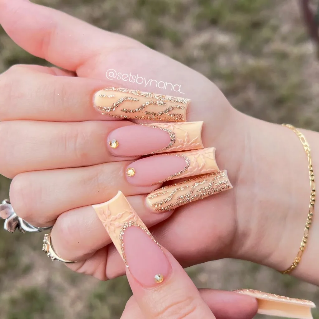 Pastel orange acrylic nails