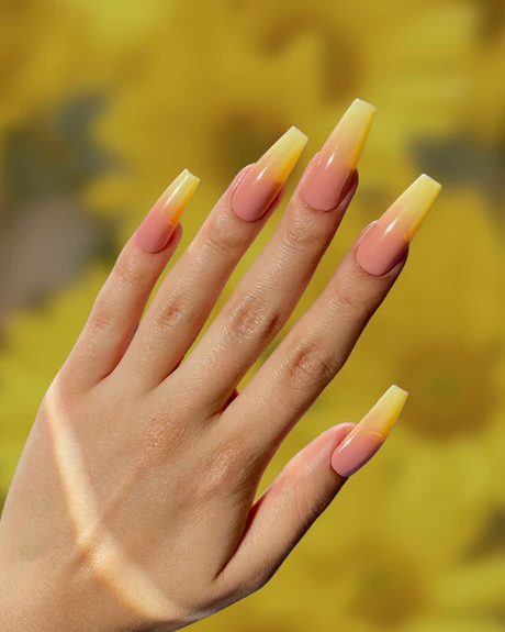 Yellow and nude ombre nails