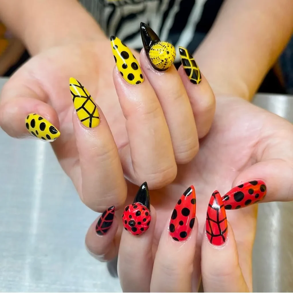 Yellow and red ladybug nails