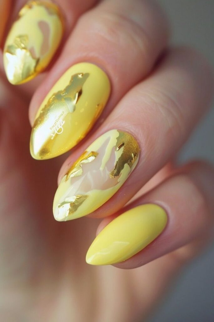 Yellow nails with a gold foil