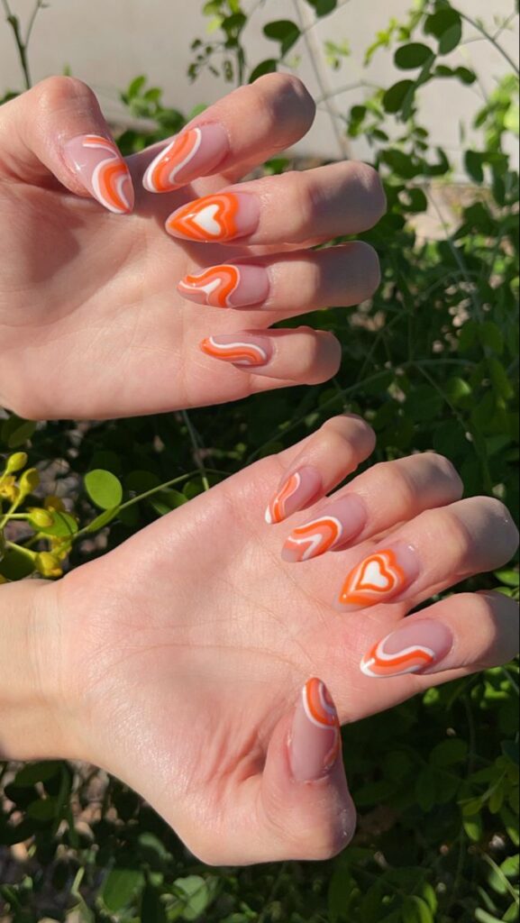 orange heartbeat nail art